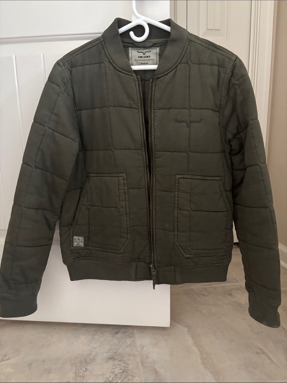 Kimes army green bomber jacket.  Women’s Size M worn once.